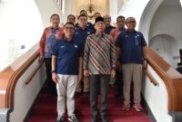 penandatanganan nota kesepahaman (MoU) yang dilakukan langsung oleh Gubernur Lampung Rahmat dan Direktur Utama PT Pos Indonesia 