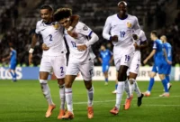 Penyerang sayap timnas Prancis Maghnes Akliouche (tengah) merayakan gol yang dicetaknya ke gawang Azerbaijan, bersama bek Malo Gusto (kiri) dan Jean-Philipe Mateta. (FIFA)