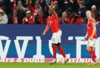 Penyerang Mainz Danny da Costa merayakan keberhasilannya mencetak gol ke gawang Hoffenheim pada pertandingan Liga Jerman di Stadion Mewa Arena, Mainz, Jumat (21/11/2025). (bundesliga.com)