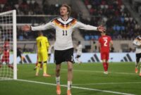 Selebrasi Nick Woltemade usai mencetak gol kedua ke gawang Luxembourg yang memastikan Jerman lolos ke Piala Dunia 2926. (Getty Images/Crystal Fix/MB Media)
