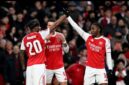 Pemain Arsenal merayakan kemenangan atas Wigan Athletic. (AFP)