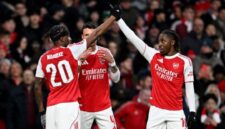 Pemain Arsenal merayakan kemenangan atas Wigan Athletic. (AFP)