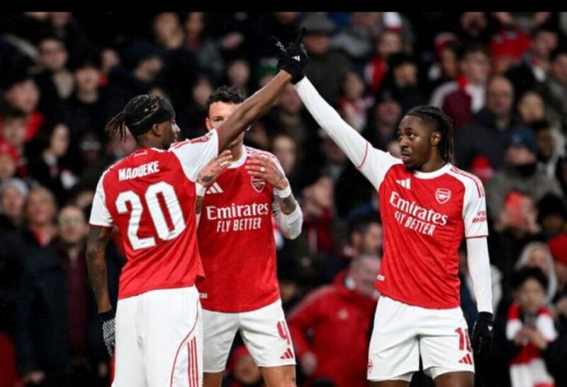 Pemain Arsenal merayakan kemenangan atas Wigan Athletic. (AFP)