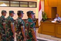 Tentara empat prajurid TNI mengikuti pembacaan vonis oleh majelis hakim. (Jennus)