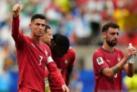 Cristiano Ronaldo melambaikan tangan ke penonton usai kemenangan besar Portugal atas Uzbekistan dalam pertandingan grup Piala Dunia 2026. (Anadolu/Hakan Zakun)