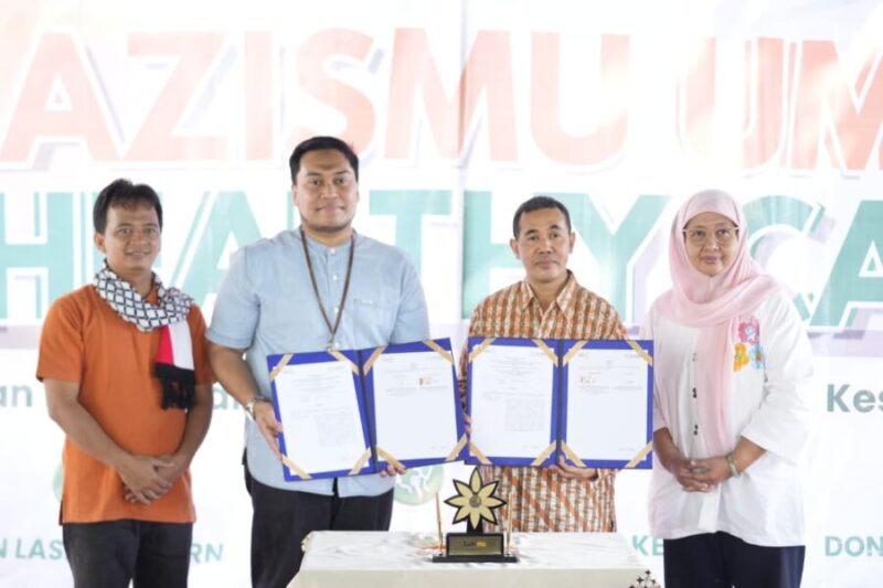 Penandatanganan kerja sama Lazismu UMY dengan RS AMC Muhammadiyah yang ditandatangani oleh Kepala Kantor Lazismu UMY dan Direktur Administrasi, Umum, dan Keuangan RS AMC Muhammadiyah
