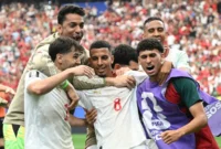 Hapus term: Para pemain Timnas Maroko merayakan kemenangan atas Kanada. (AFP/Ronaldo Schmidt) Para pemain Timnas Maroko merayakan kemenangan atas Kanada. (AFP/Ronaldo Schmidt)