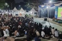 Ratusan warga memadati area Pasar Kreatif dan Seni PKOR Way Halim, Bandar Lampung, untuk menyaksikan nonton bareng Piala Dunia FIFA 2026
