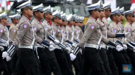 Ilustrasi - Pasukan polisi (CNBC)