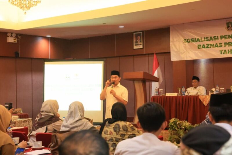 Achmad Dimyati Natakusumah menyampaikan paparan dan pemikiran saat menjadi narasumber dalam acara Sosialisasi Pengelolaan Zakat, Infak, Sedekah, dan Dana Sosial Keagamaan Lainnya (ZIS-DSKL) BAZNAS Provinsi Banten Tahun 2026 di Hotel Horison
